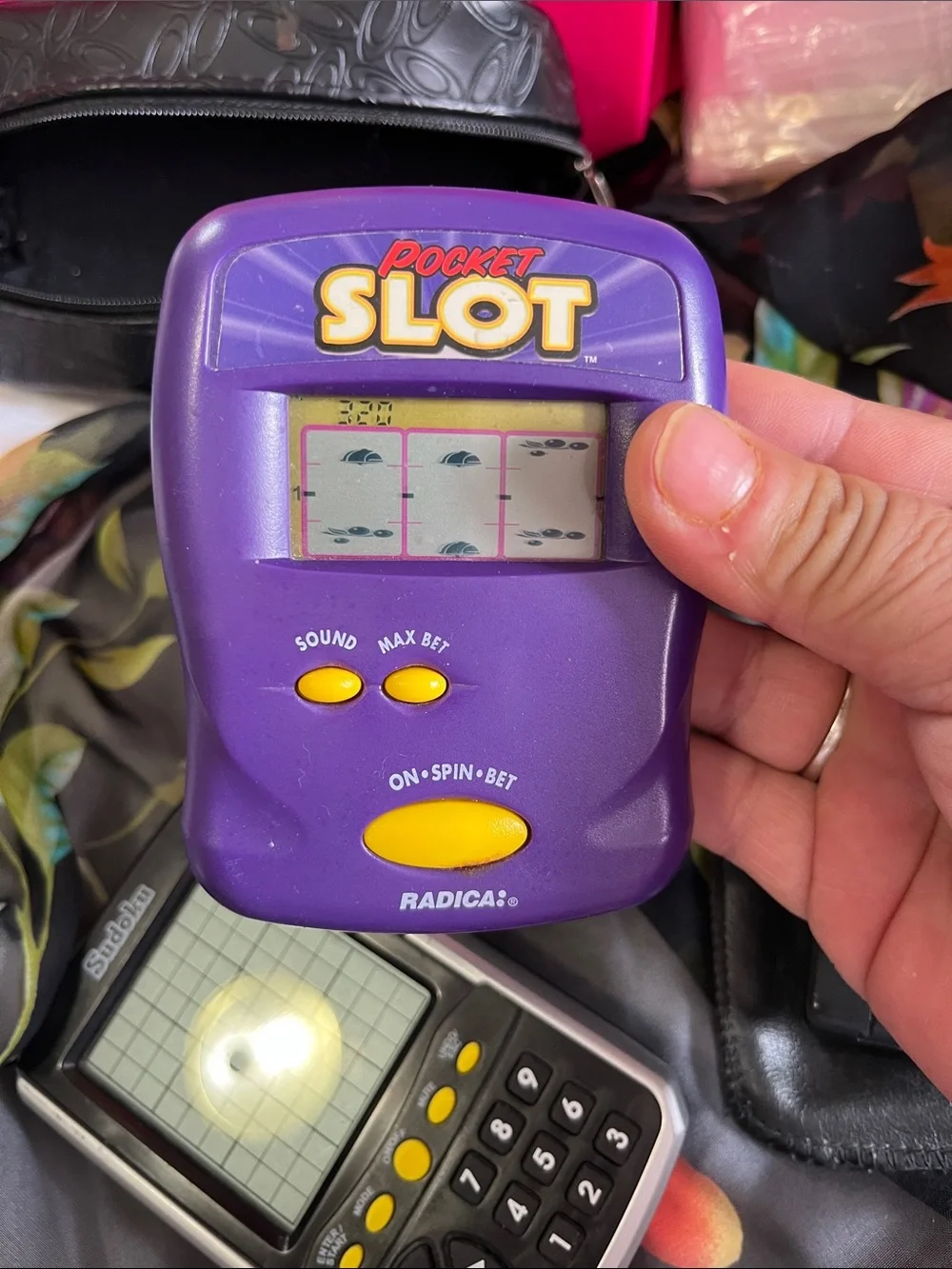 Purple Pocket Slot Electronic Handheld Game by